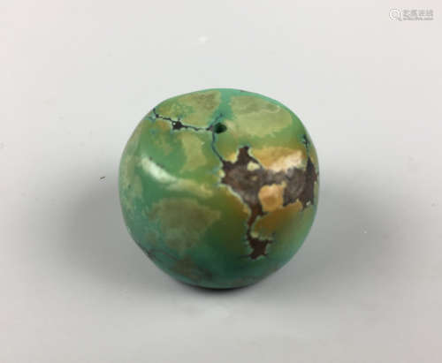 AN OLD TURQUOISE BEAD