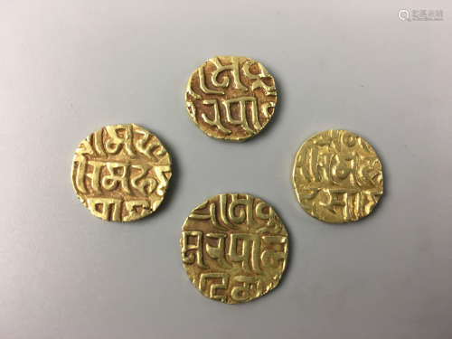 FOUR ANCIENT INDIAN GOLD COINS