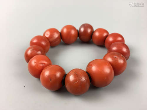A STRING OF OLD RED AGATE BEADS