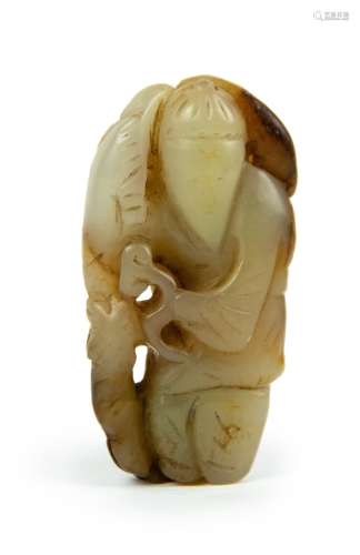 A CARVED JADE FIGURE OF A SAGE