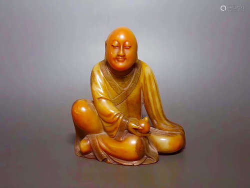 A BUDDHA DESIGN FIELD YELLOW STONE ORNAMENT