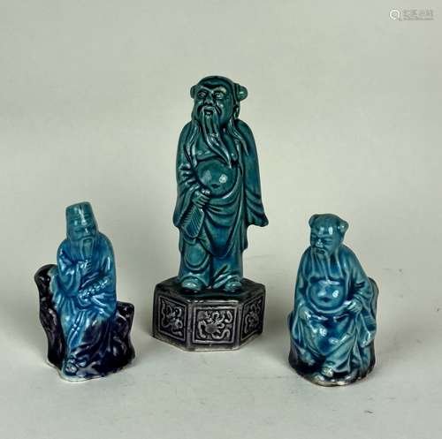 SET OF THREE BLUE GLAZED PORCELAIN FIGURES