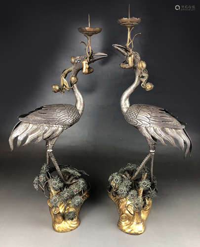 PAIR OF CHINESE SILVER-PLATE CRANE FORM CANDLESTICKS