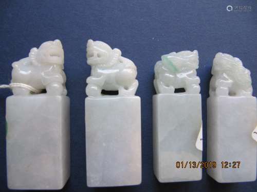 SET OF FOUR JADEITE DRAGON SEALS