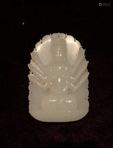 CARVED WHITE JADE MULTI ARMED DEITY PENDANT