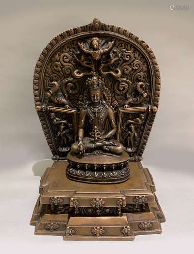 A BRONZE FIGURE OF BUDDHA AND A MANDORLA AND STAND