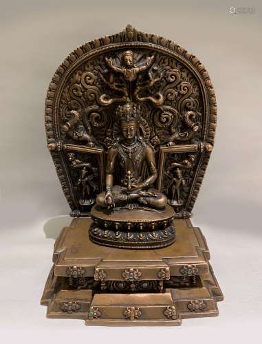 A BRONZE FIGURE OF BUDDHA AND A MANDORLA AND STAND