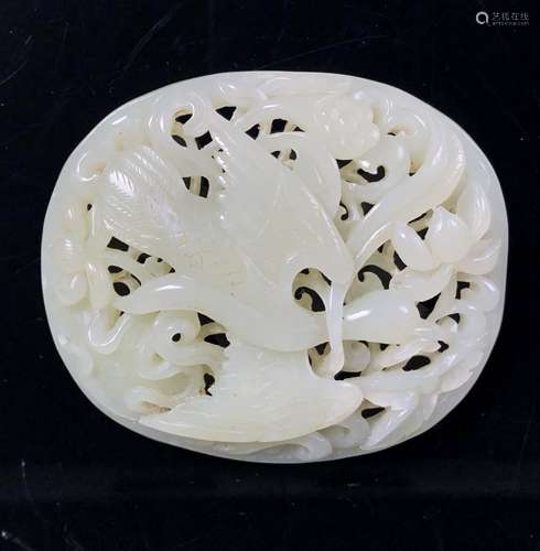 PIERCED JADE CARVING OF BIRD AND BUSH