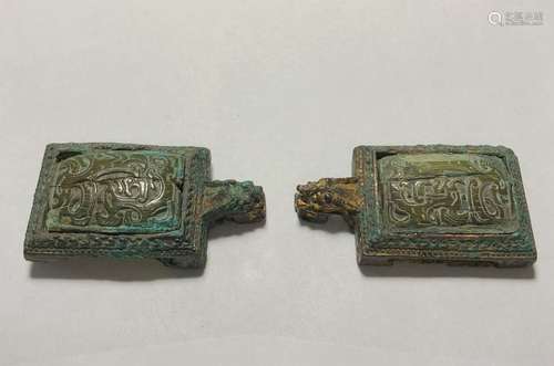 PAIR OF ARCHAISTIC BRONZE BELT BUCKLES