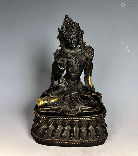 A BRONZE FIGURE OF TARA