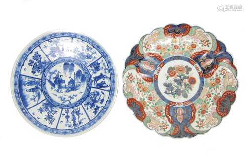 Meiji era An Arita blue and white charger and an Imari charger