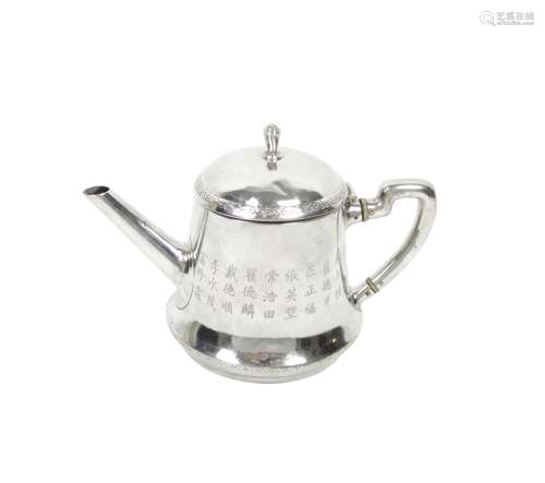 Circa 1930 A silver teapot with hinged cover