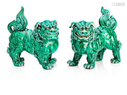 Early 20th century A pair of green-glazed porcelain shishi