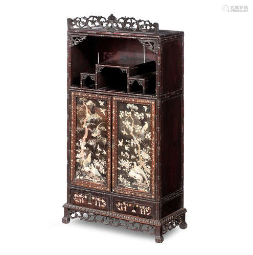 Qing Dynasty, late 19th century A blackwood 'faux-bamboo'-framed cabinet with embroidered silk panel doors