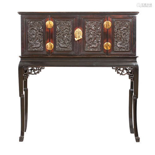 Cabinet Qing dynasty, the stand later circa 1900 A huanghuali cabinet on a stained-wood stand