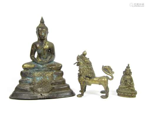 19th century A Thai bronze Buddha, a Tibetan bronze lion dog and a small bronze bodhisattva