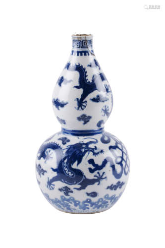 CHINE, XIXe siècle  Vase double gourde en porcelaine bleu et blanc