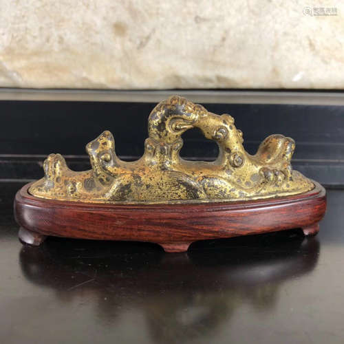 A GILT COPPER PEN HOLDER