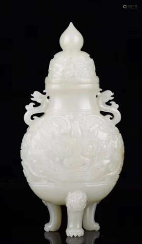 A HETIAN JADE CARVED TAOTIE PATTERN TRIPOD VASE