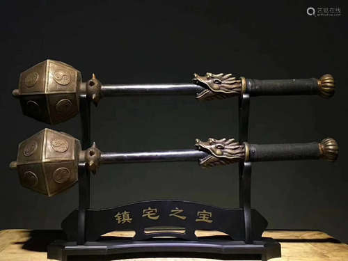 PAIR OF BUGUA HAMMER