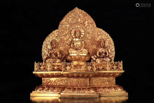 A GILT BRONZE STAGE AND BUDDHA STATUE