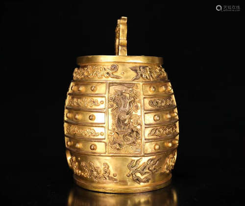 A GILT BRONZE CHIMES SHAPED SINGLE HANDLE POT