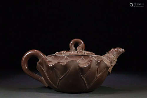 A LOTUS DESIGN PURPLE CLAY TEAPOT