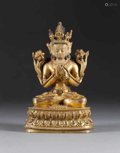 SITZENDER BODHSATTVA Tibet, 18./19. Jh. Bronze, vergoldet, Steinbesatz. H. 20,5 cm. Im Boden