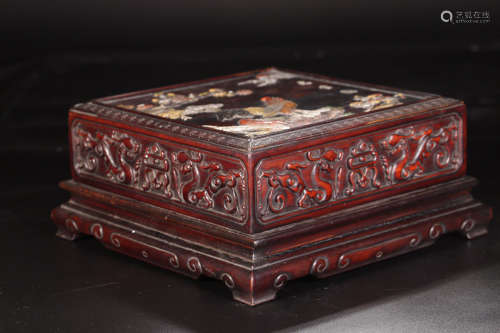 A RED WOOD CARVED GEM DECORATED BOX