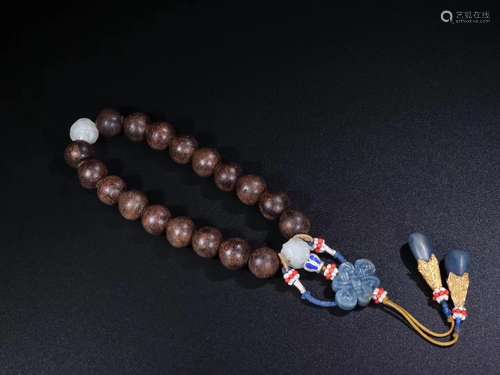 A CHENXIANG WOOD BEAD STRING BRACELETQ