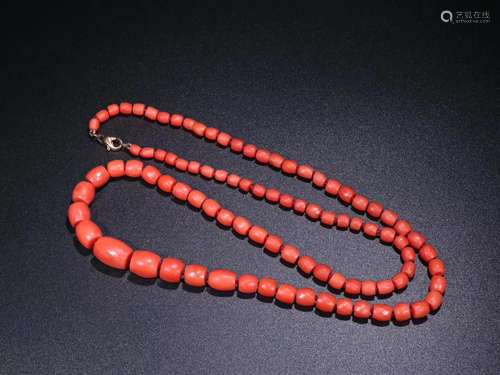 A MOMO CORAL BEAD STRING NECKLACE