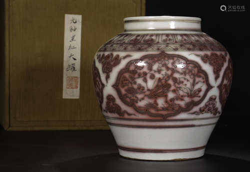 A WHITE AND RED GLAZE WRAPPED LOTUS PATTERN JAR