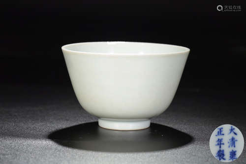 A WHITE GLAZE CASTED CUP