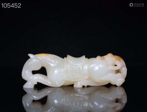 A HETIAN JADE CARVED MONKEY SHAPED PENDANT