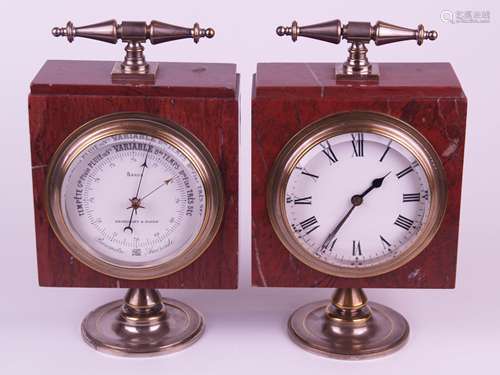 Schreibtischuhr & Barometer - Messing /Marmor,19.Jh.,jeweils rotes quadratisches<br />Marmorgehäuse mit profiliertem Rundfuß und Tragegriff aus Metall,versilbert tlw.stark berieben,Emailzifferblätter, Uhr mit 8-Tage-Messingwerk,sign. R & Co. Paris, rundes Werk mit Zylinderechappement,der Aneroid Barometer sign. Breul Francfort & Baden,tlw.gebläute Zeiger,min.Chips an Kanten,rückseitige Abdeckung am Barometer fehlt,Höhe ca.19,5 cm