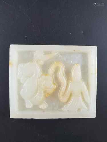 Qing Dynasty Jade belt buckle - 19th century China, jade of dark white colour with a few<br />ocher-colored inclusions, carved rectangular plaque with a mythological scene depicting a mythical creature and a figure, on the verso some chips to the upper edge, c.5.8x6.9cm