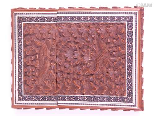 Narrow wooden case - China / India, beech tree veneer, flattened high-rectangular shape<br />with lids, front and back finely carved with leaves, dragon and phoenix in flat relief, decorations with geometric stone and nacre inlays, edges with carved leaf decor, ca.11x8,5x2cm