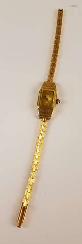 Laides wristwatch - Fella Switzerland, high-rectangular chased case 14K yellow gold,<br />stamped 585, gold-colored dial with arabic numerals and two hands, narrow limbs, handwinding, L.ca.18cm, weight ca.16g, functioning