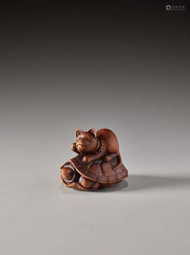 A RARE WOOD NETSUKE OF A CAT AND TORTOISE BY SHOKIN