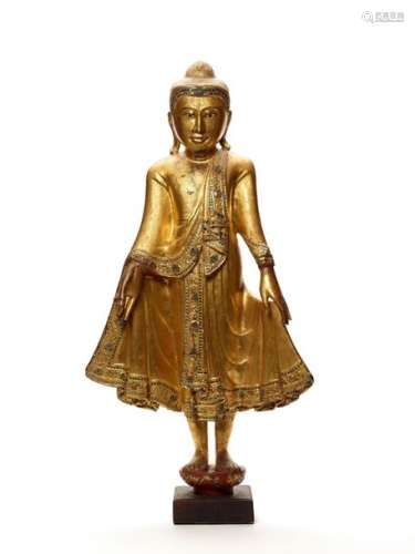 A BURMESE WOOD SCULPTURE OF A STANDING MANDALAY BUDDHA,…