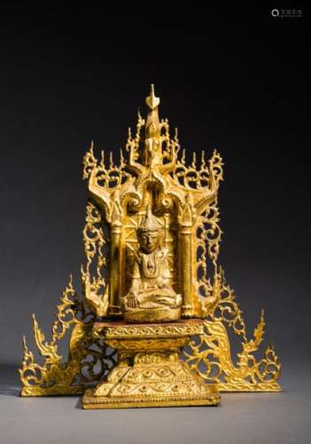 A BURMESE GOLD LACQUER WOOD ALTAR WITH A BUDDHA FIGURE,…