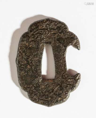 A SMALL TSUBA WITH FOLIAGE