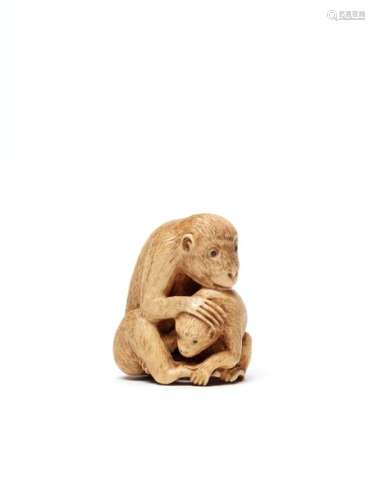 A BONE NETSUKE DEPICTING A MONKEY AND ITS YOUNG, 19th C…