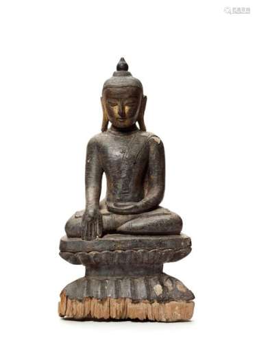 A BURMESE LACQUERED WOOD FIGURE OF A SEATED BUDDHA, 19T…