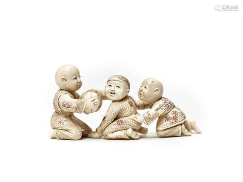 A MEIJI PERIOD IVORY NETSUKE OKIMONO DEPICTING THREE BO…