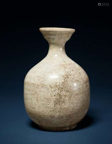 A VASE SHAPED GLAZED CERAMIC VESSEL