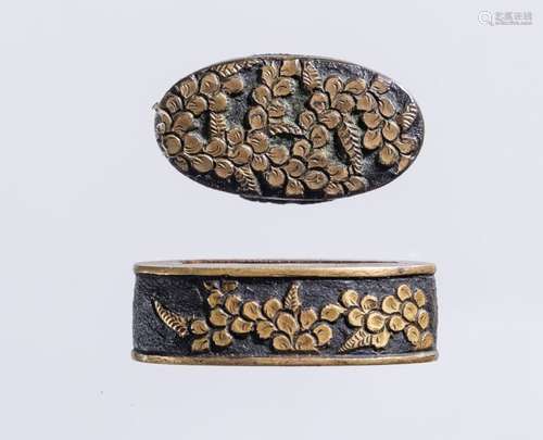 GILT SHAKUDO FUCHI KASHIRA WITH BLOSSOMS