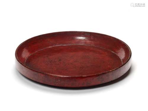 A LARGE BURMESE RED LACQUERED WOODEN TRAY, C. 1920