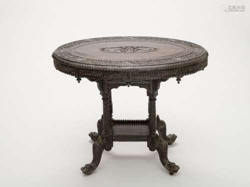 TABLE WITH RICH CARVED DECOR