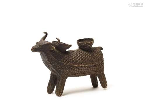 A RARE KONDH TRIBAL BRONZE OF A WATER BUFFALO WITH OFFERING VESSELS